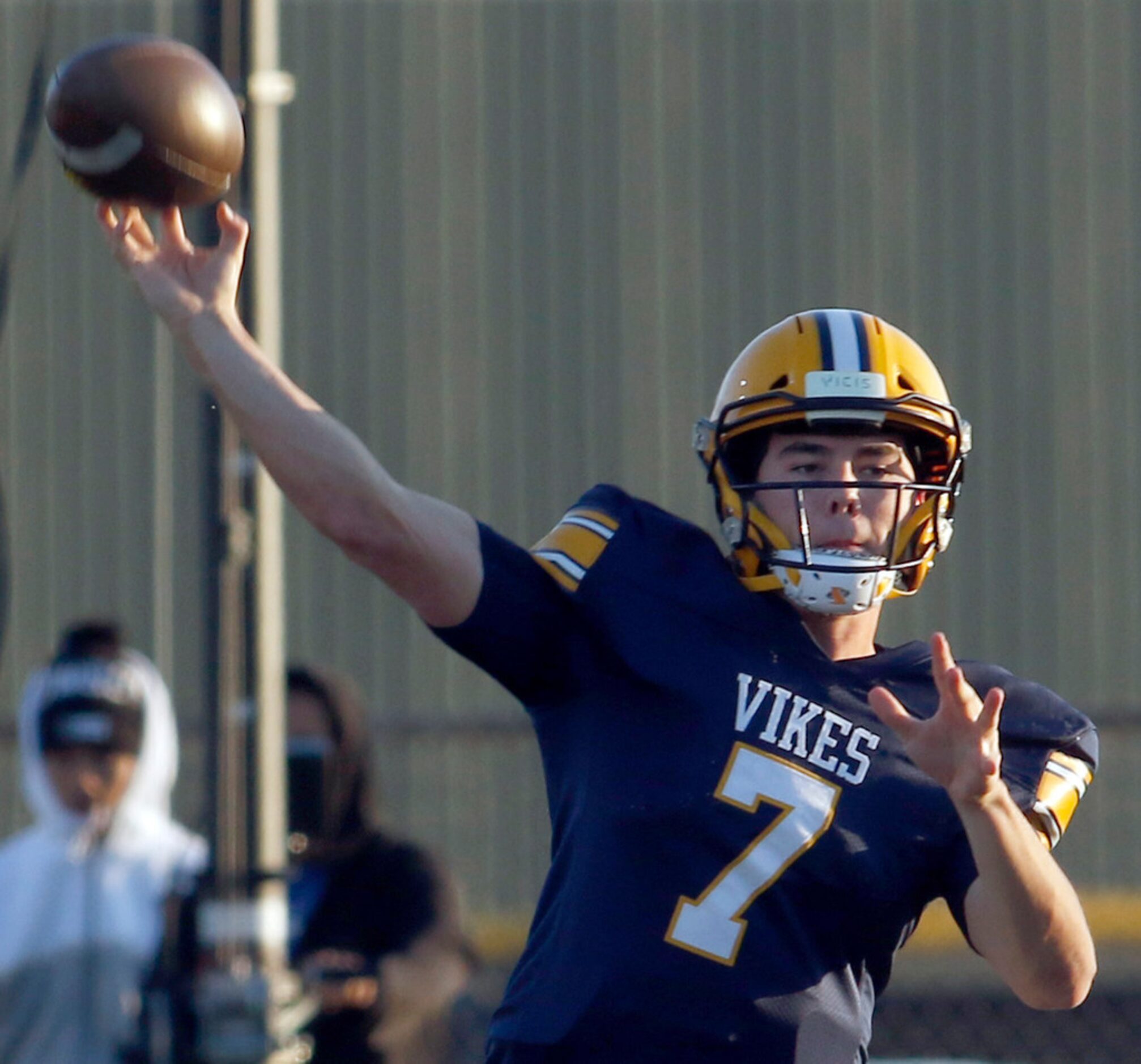 Arlington Lamar Vikings quarterback Jack Dawson (7) launches a long pass during second...