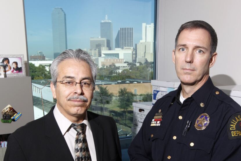 Dallas police Lt. Miguel Sarmiento of the family violence unit and Maj. Robert Sherwin hope...