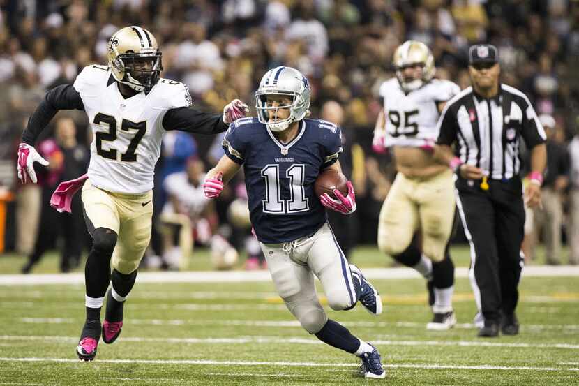 Dallas Cowboys wide receiver Cole Beasley (11) gets past New Orleans Saints cornerback...