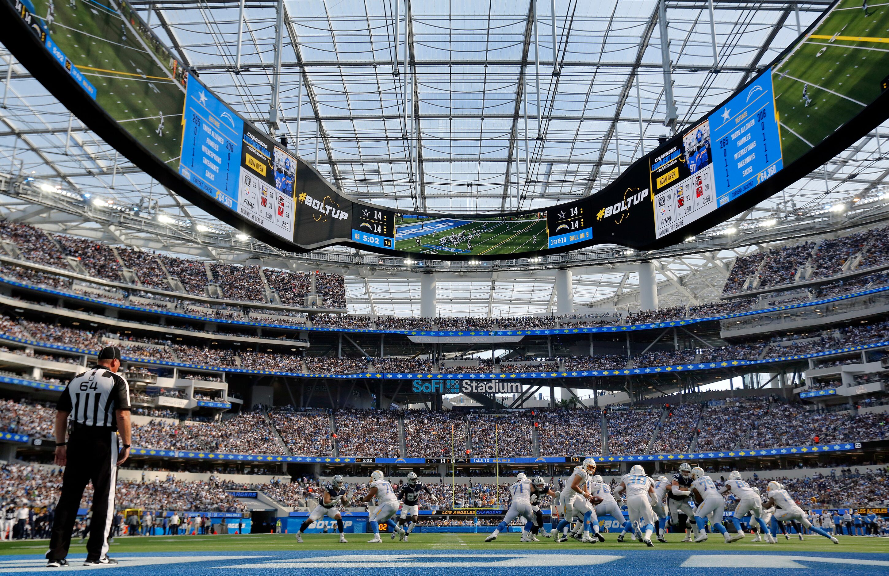 The Los Angeles Chargers run a play deep in their own territory against the Dallas Cowboys...