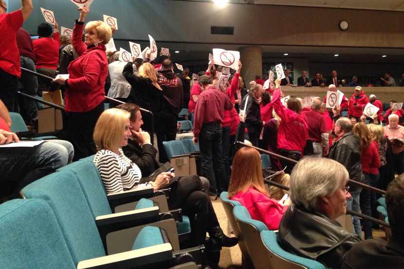  Plano Future members show their disdain for the city council by turning their backs on them...