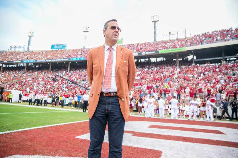 Texas Longhorns athletic director Chris Del Conte  looks on during pregame of an NCAA...