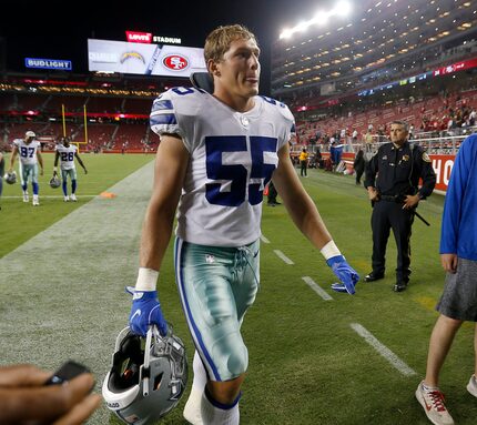 Cowboys linebacker Leighton Vander Esch (55) walks off the field after a 24-21 loss to the...