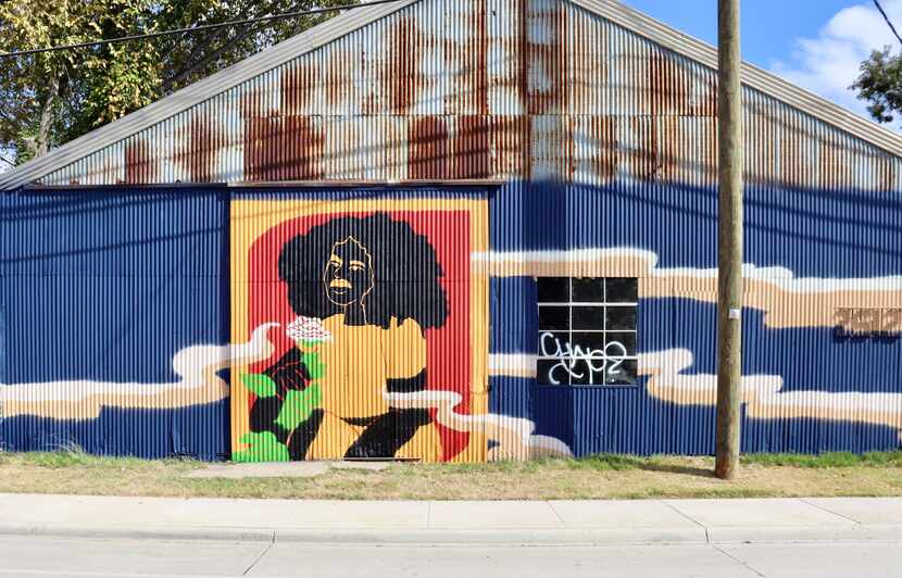 Artist Desireé Veniecia painted a mural called “Black Beauty Is an Act of Resistance” in...