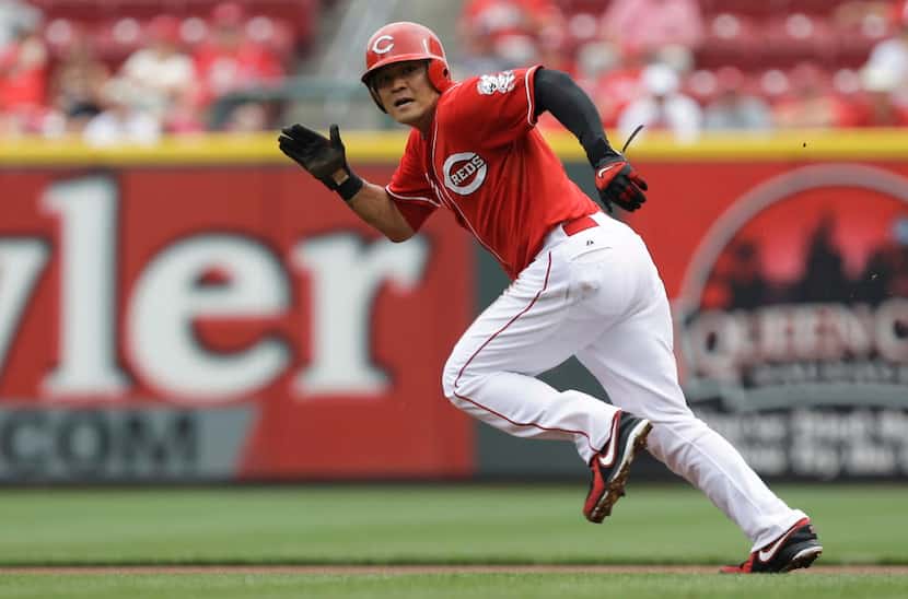 In this Aug. 7, 2013, file photo, Cincinnati Reds' Shin-Soo Choo runs to second base in the...