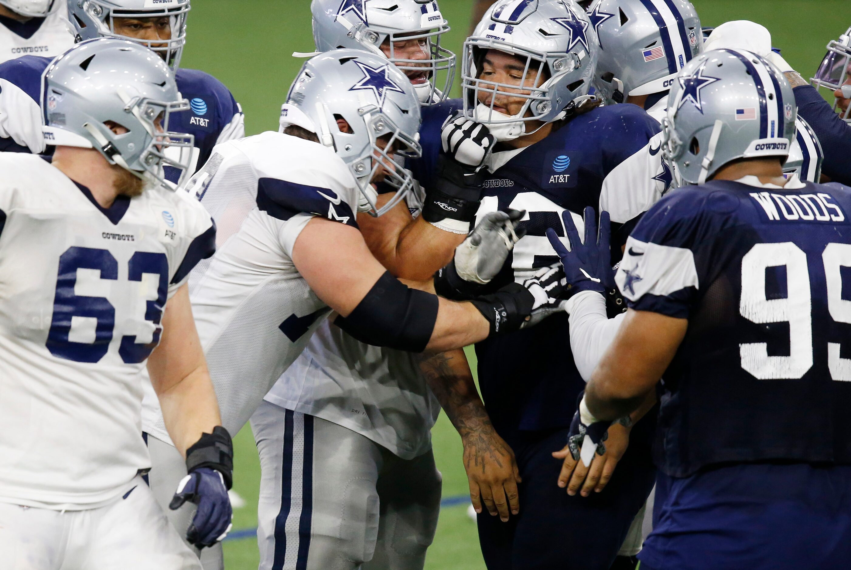 Dallas Cowboys guard Zack Martin (70) and Dallas Cowboys defensive tackle Trysten Hill (97)...