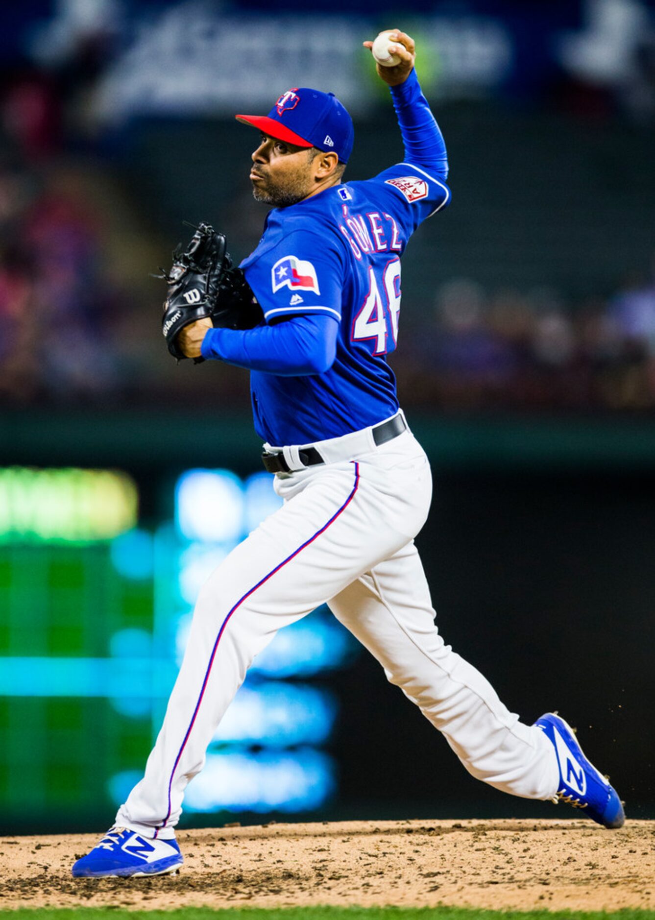 Texas Rangers pitcher Jeanmar Gomez (46) pitches during the fifth inning of a spring...