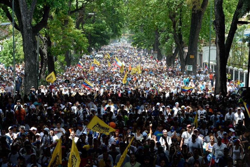 Thousands of demonstrators rallied Wednesday against Venezuelan President Nicolas Maduro in...