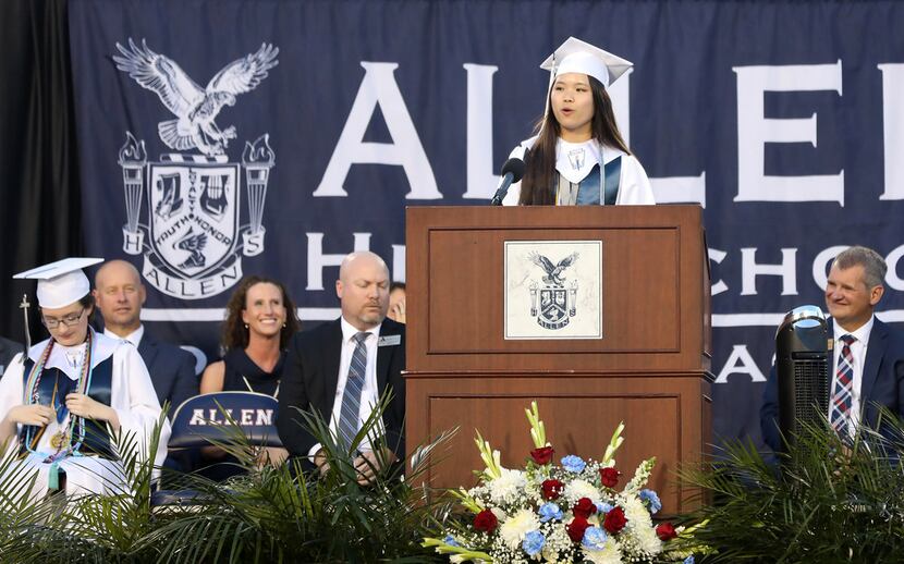 Valedictorian Samantha Cheng delivers her speech during the Allen High School graduation at...
