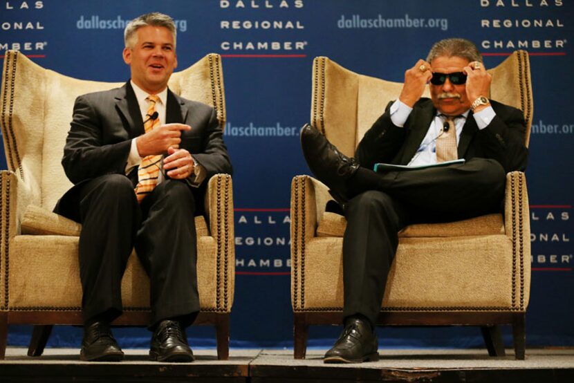  Board President Eric Cowan (left) points to Interim Superintendent Dr. Michael Hinojosa as...