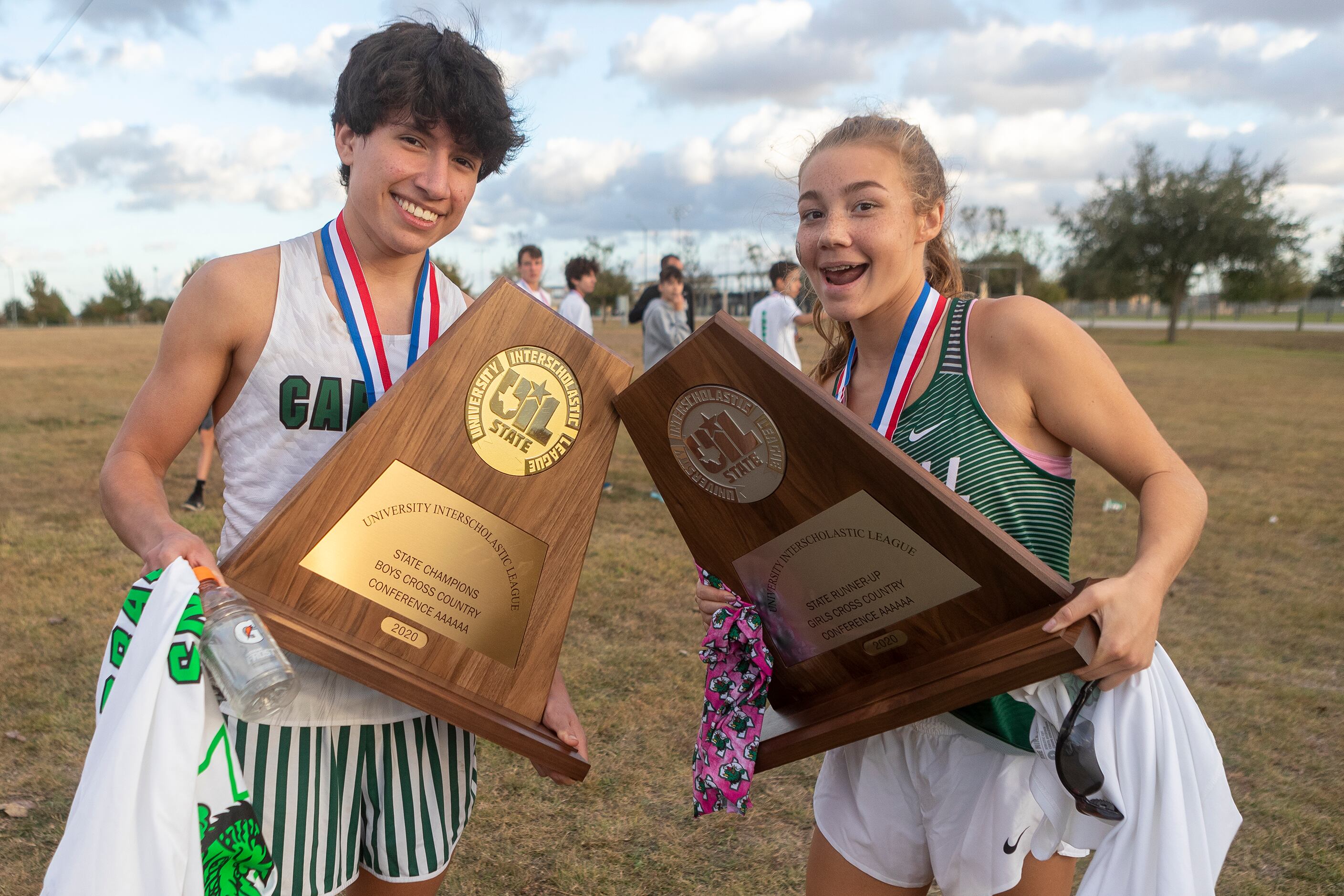 Southlake Carroll's Solomon Chavez and Oliva Jones celebrates their first place and second...