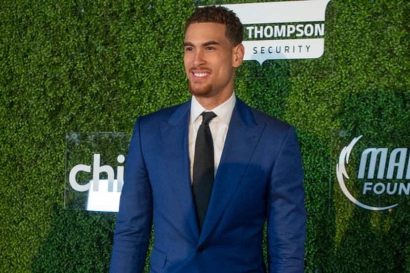 Mavs player Dwight Powell pauses on the blue carpet prior to the Mavs Ball at Million Air in...