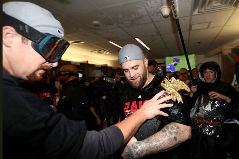 TORONTO, ON - OCTOBER 19:  Mike Napoli #26 of the Cleveland Indians celebrates with his...