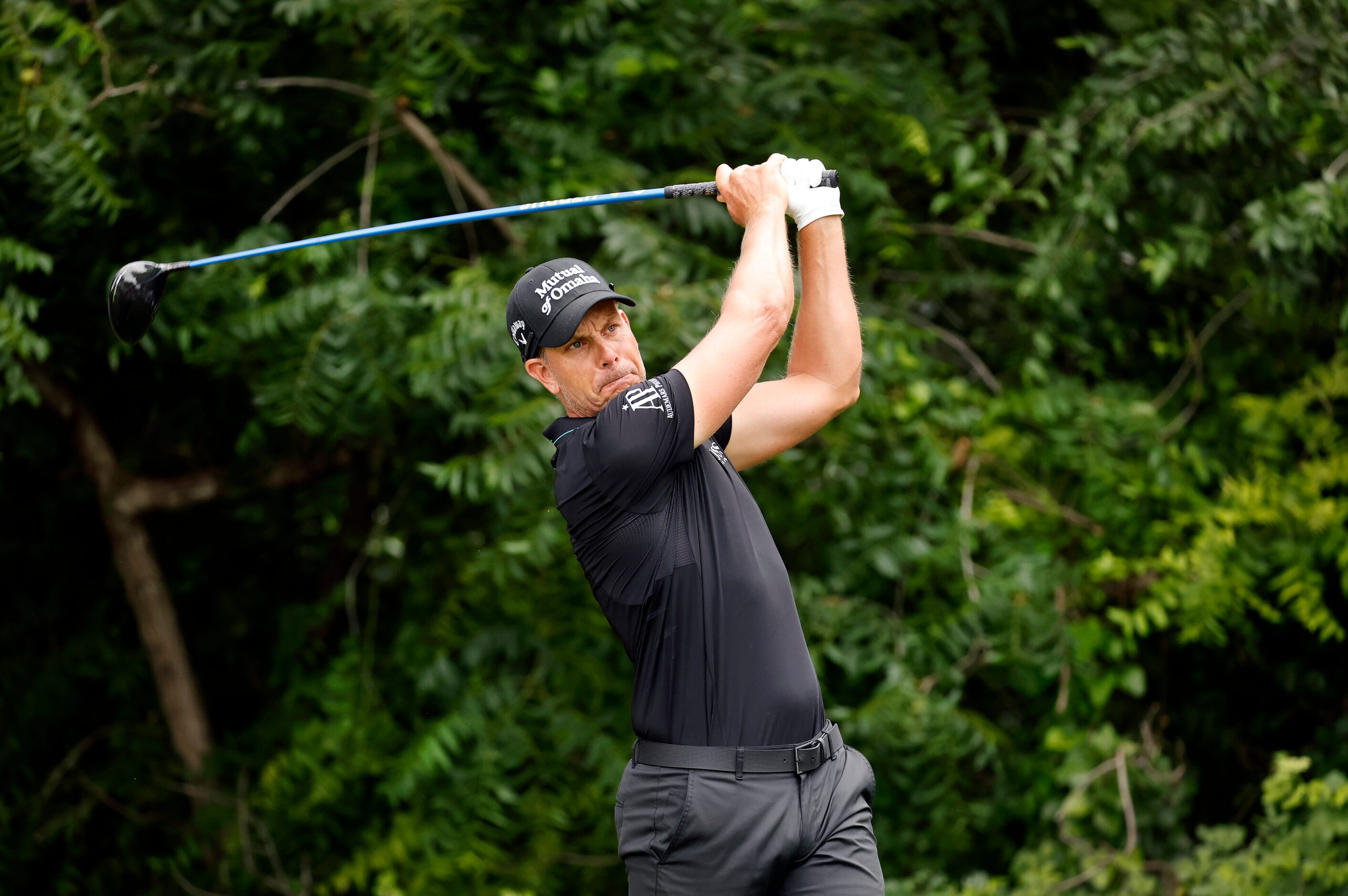 Professional golfer Henrik Stenson hits his drive off the No. 6 tee box during round two of...