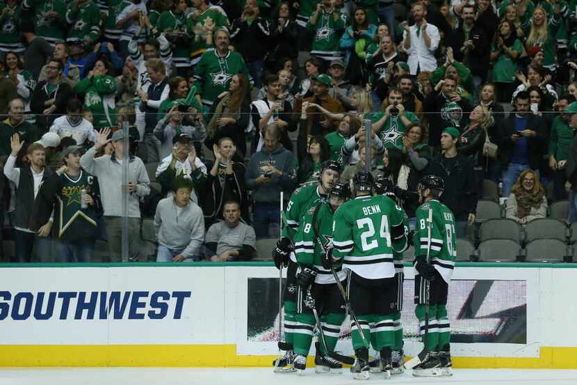 Dallas Stars players and fans celebrates a goal by right wing Ales Hemsky (83) to make the...