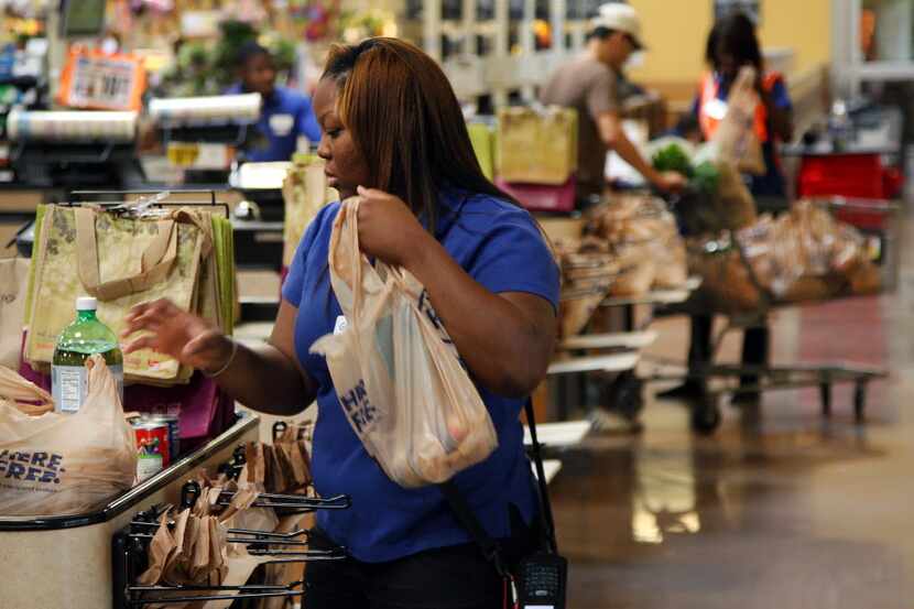 Starting Jan. 1, Dallas shoppers can avoid paying a 5-cent fee per grocery bag by toting a...