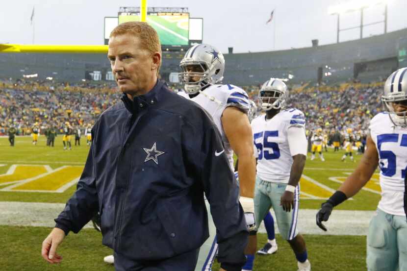 Dallas Cowboys head coach Jason Garrett headed to the locker room following warmups before...