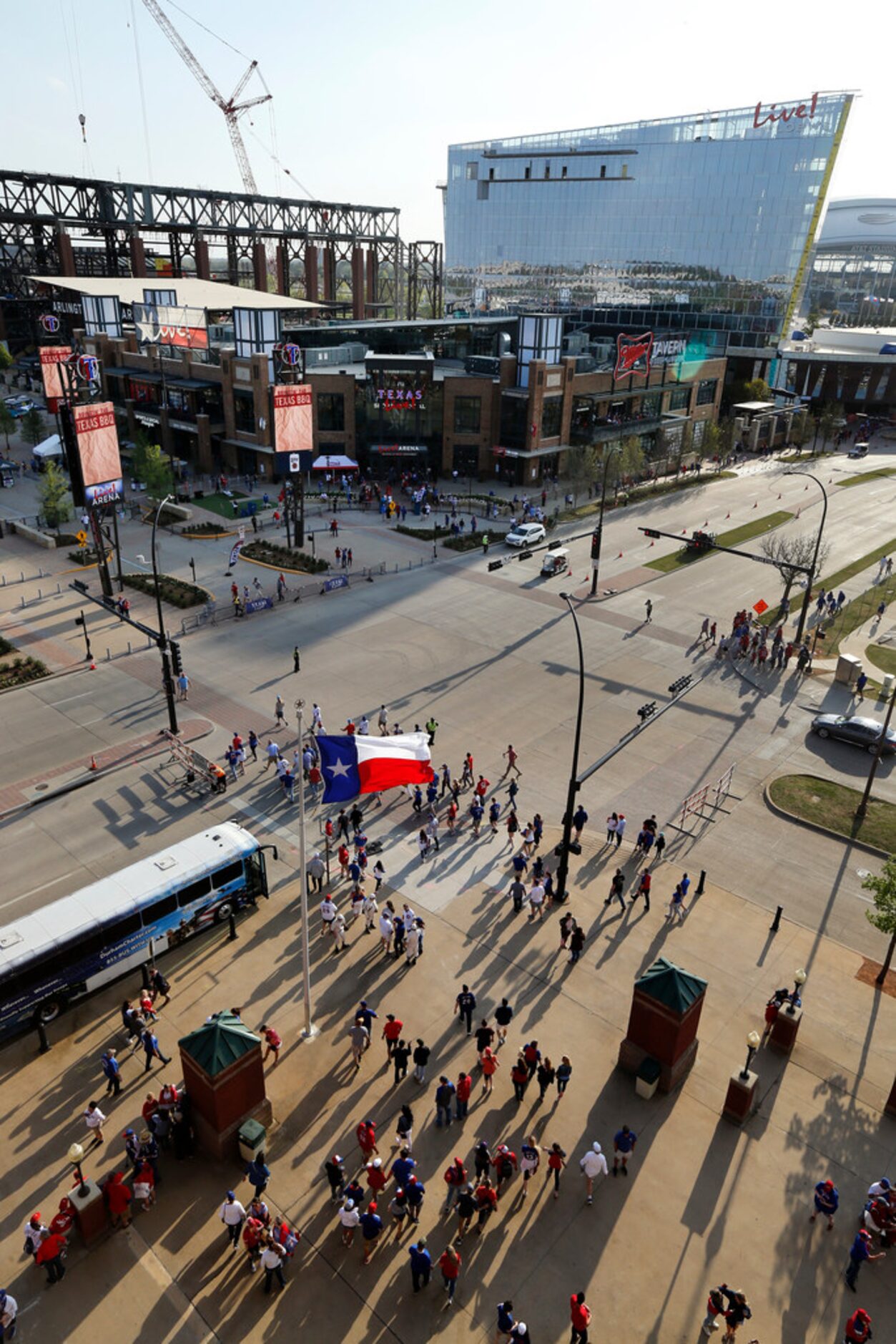 Texas Rangers fans leave early from Globe Life Park as the Rangers were being drummed by the...