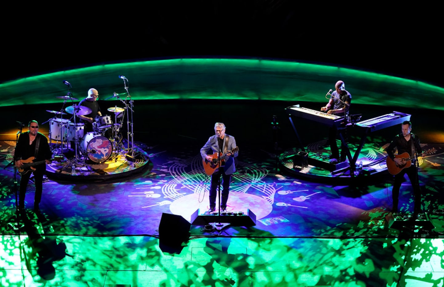 Steve Miller of the Steve Miller Band, center, Kenny Lee Lewis; bass guitar, back-up vocals,...