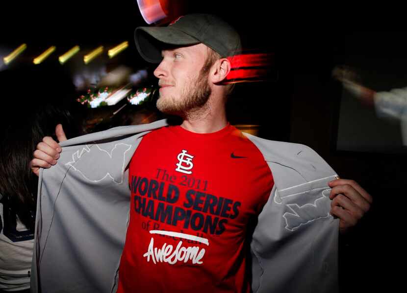 Nike employee and Cardinals fan Brad Mace shows off the Nike Cardinals World Series 2011...