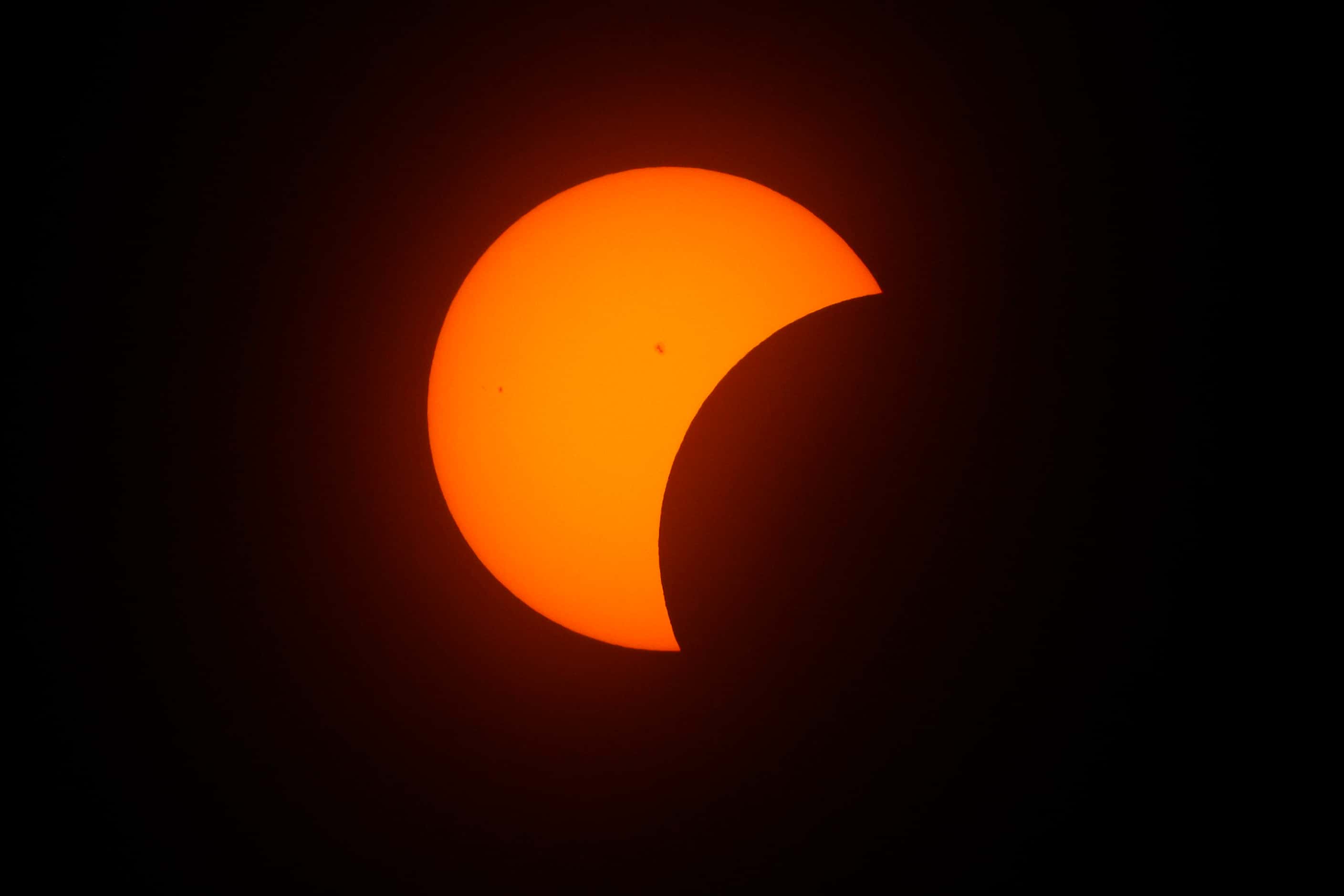 Sun spots are visible during a partial solar eclipse, Monday, April 8, 2024, in Hillsboro,...