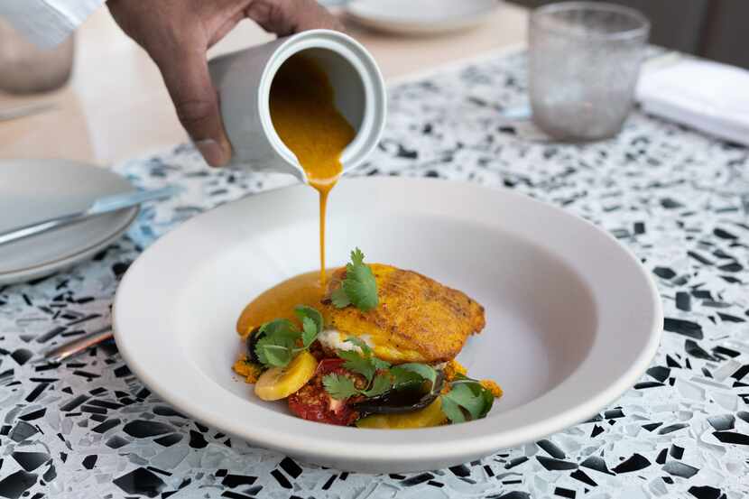 Skate moqueca, charred plantain, coconut broth and steamed rice at the restaurant Meridian.