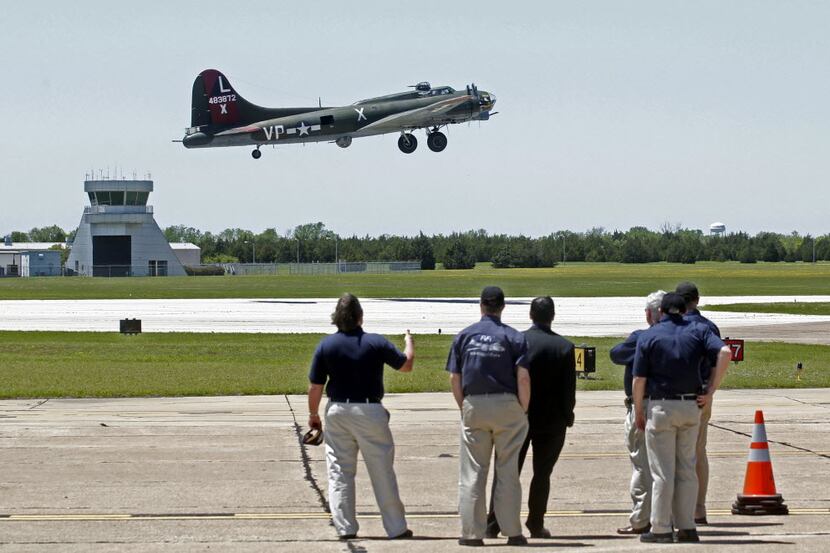 A B17G Bomber takes off  from the Dallas Executive Airport on April 29, 2014.