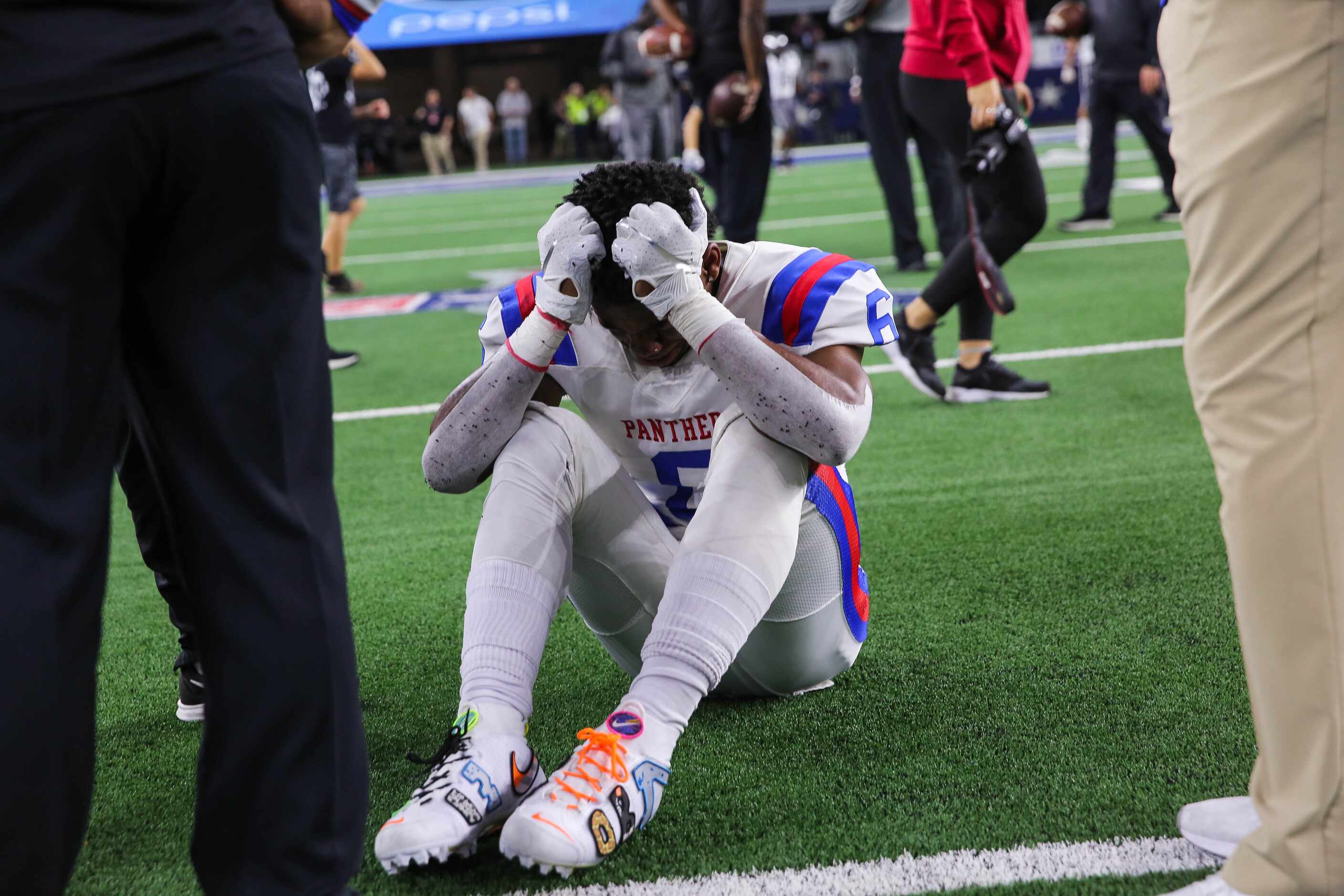 Duncanville's WR Marquelan Crowell (6) is emotional after losing a Class 6A Division I state...