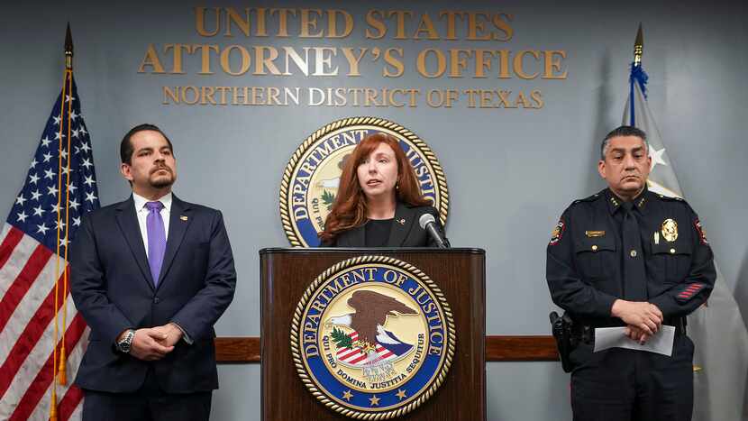 U.S. Attorney Leigha Simonton (center) addresses a news conference with DEA Dallas Special...