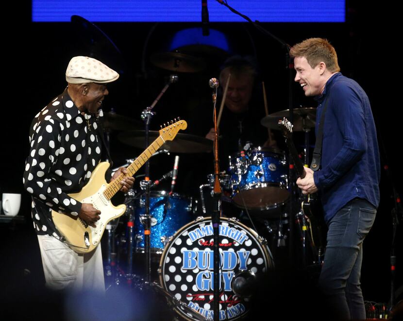 Buddy Guy (left) and Jonny Lang trade licks while they perform at the Crossroads Guitar...
