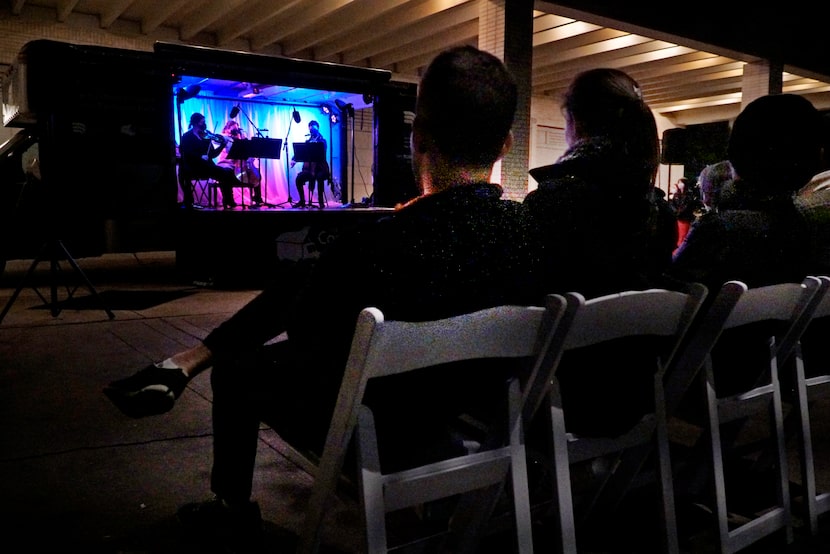 Members of the Dallas Symphony Orchestra play in the Concert Truck at NorthPark Mall in...