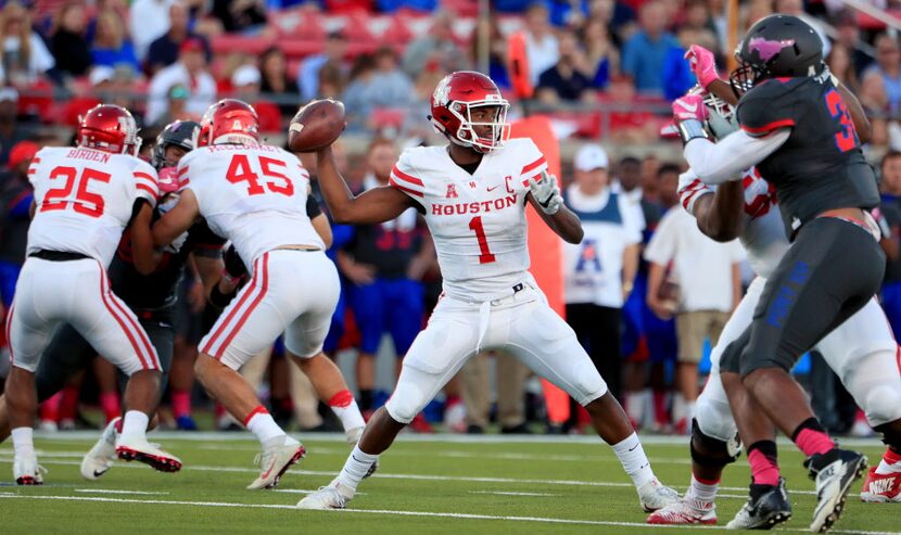 DALLAS, TX - OCTOBER 22:  Greg Ward Jr. #1 of the Houston Cougars looks for an open receiver...