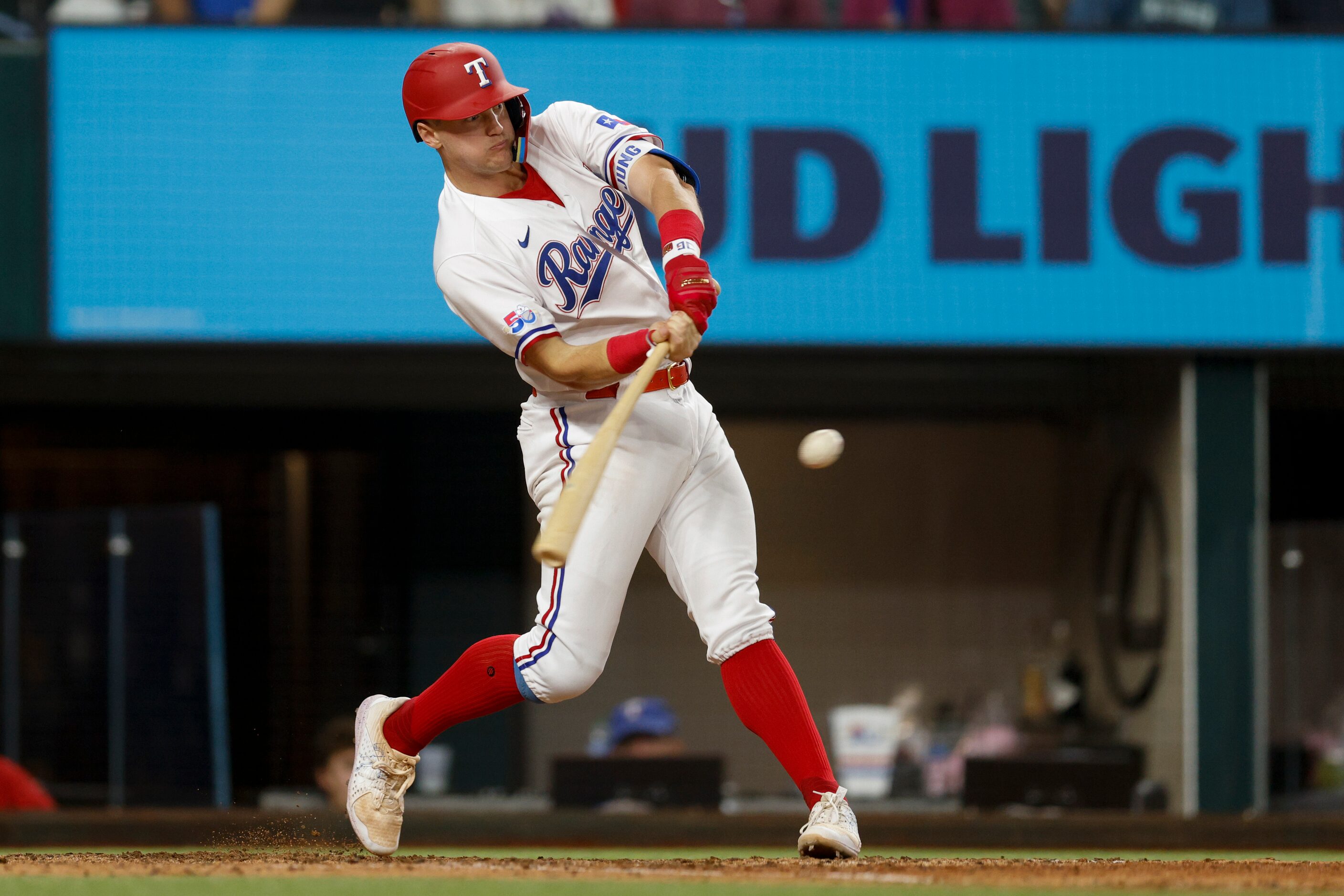 Texas Rangers third baseman Josh Jung (6) singles to left field to end a no-hitter during...