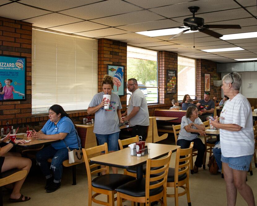 Locals enjoy lunch at the Dairy Queen in Cooper, Texas, on Thursday, July 11, 2019. 
