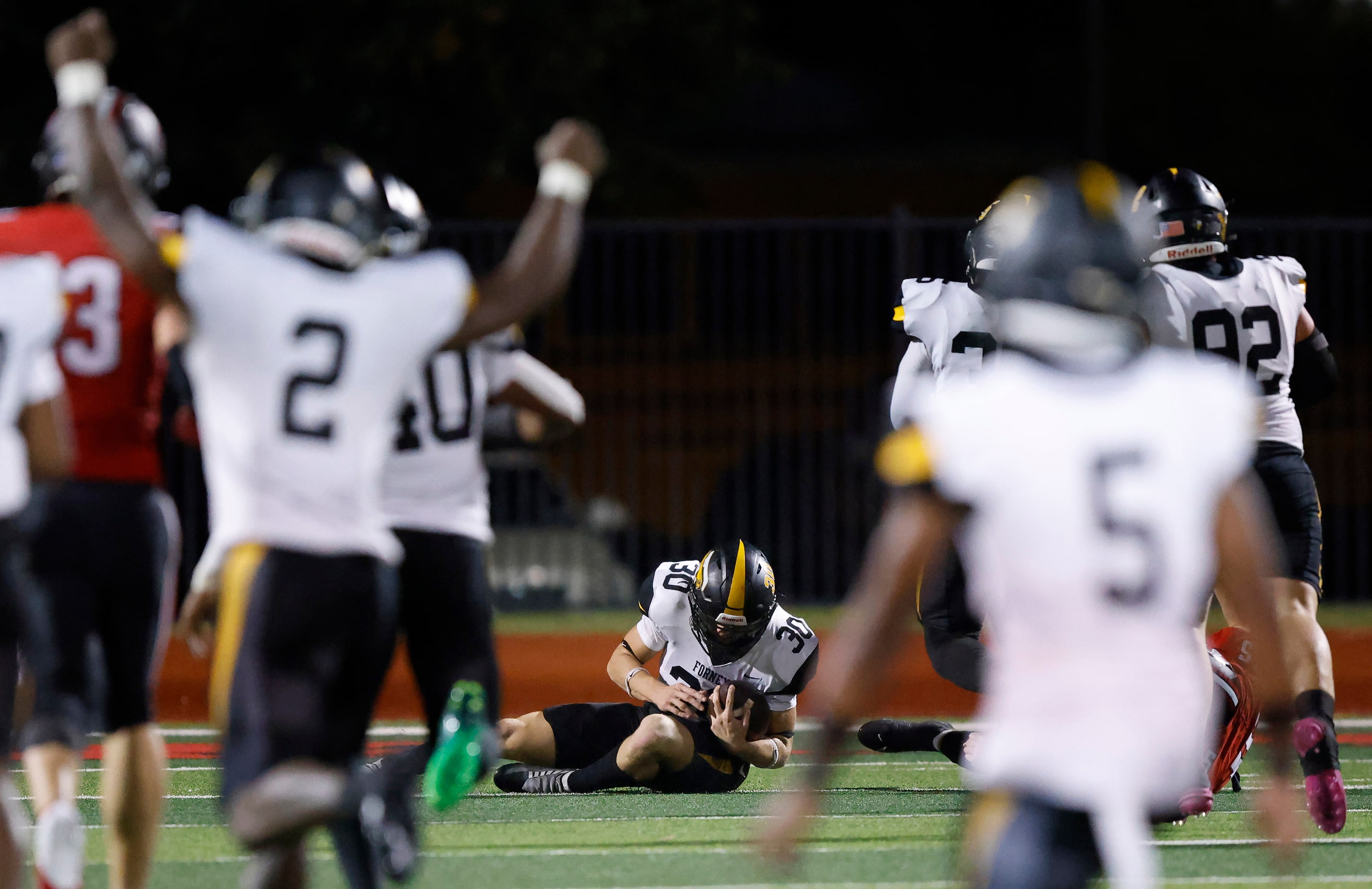 Forney linebacker Bryce Lott (30) secured the game-sealing interception late in the fourth...