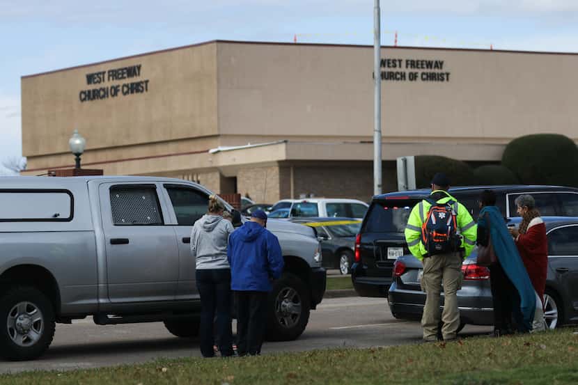 The gunman fatally shot two men before a member of the church's volunteer security force...