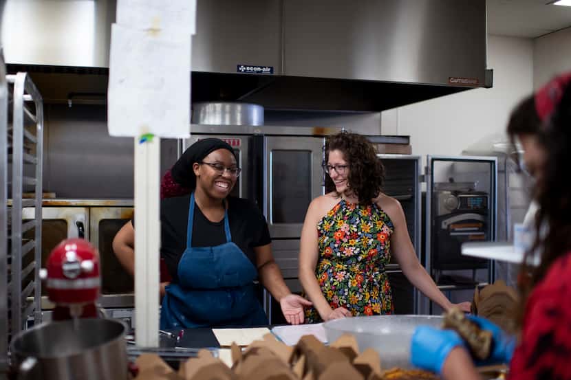 From left, Erika Griffin and Kelly Ball share a laugh at Leila Bakery & Cafe in Dallas,...
