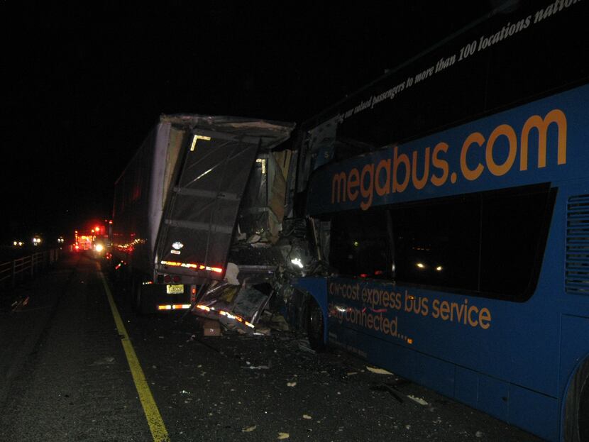 Two buses, including a Megabus, were involved in a three-vehicle crash with a semi trailer...
