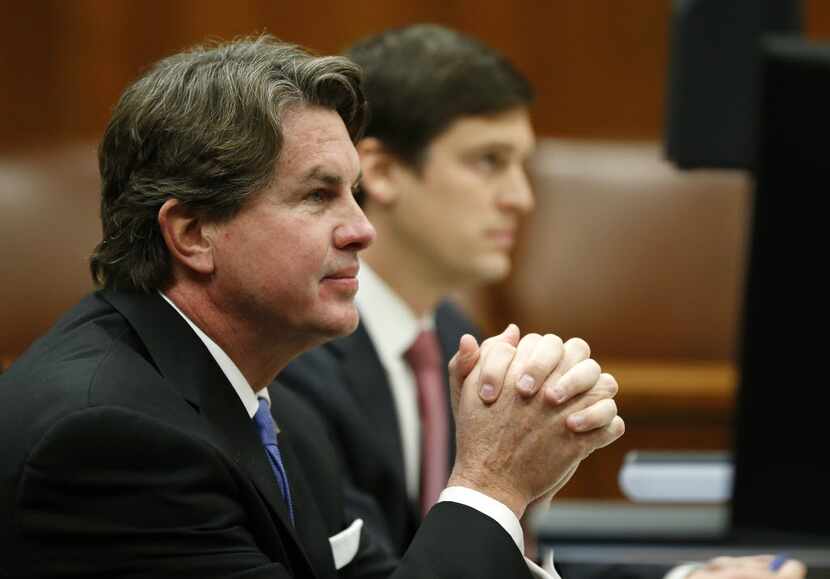 Plaintiff Jeffory Blackard, left, and his attorney Austin Champion listen to Judge Mark...