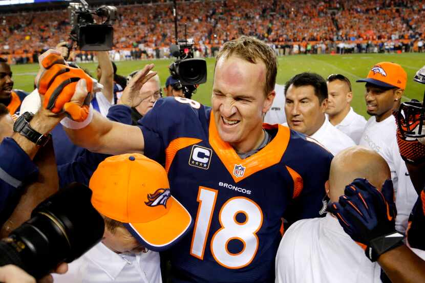FILE - In this Oct. 19, 2014, file photo, Denver Broncos quarterback Peyton Manning...