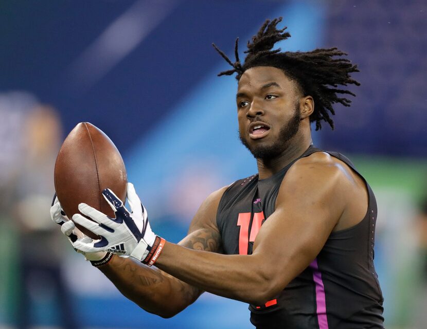 Indiana tight end Ian Thomas runs a drill during the NFL football scouting combine,...