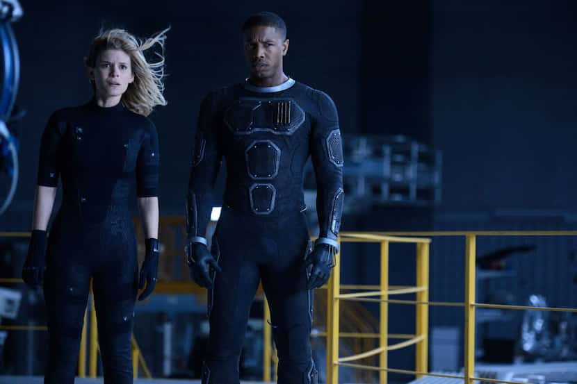 Kate Mara as Sue Storm and Michael B. Jordan as Johnny Storm in Fantastic Four.