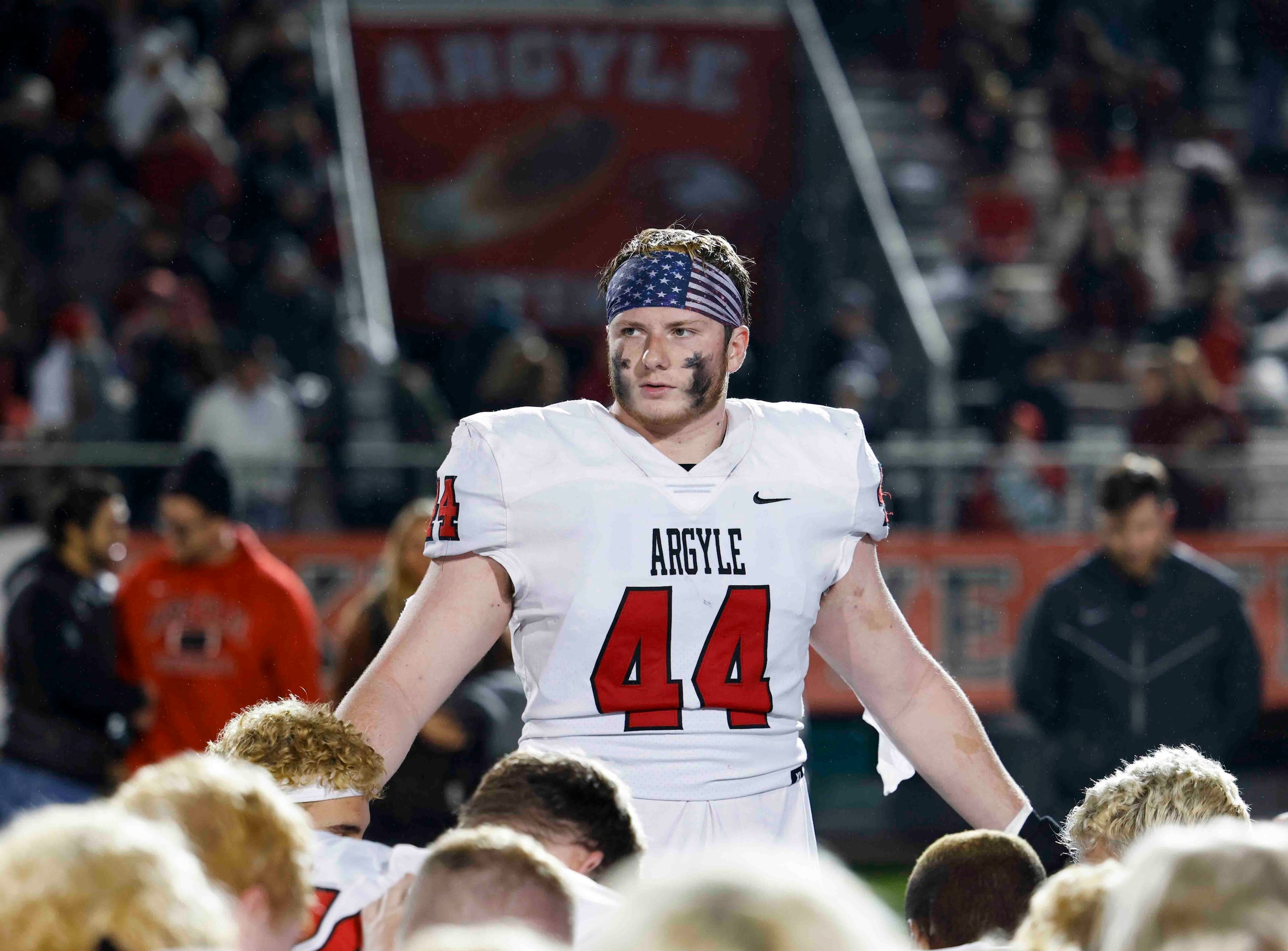 Argyle High’s Riley Van Poppel leads a prayer after winning against Grapevine High at Dragon...