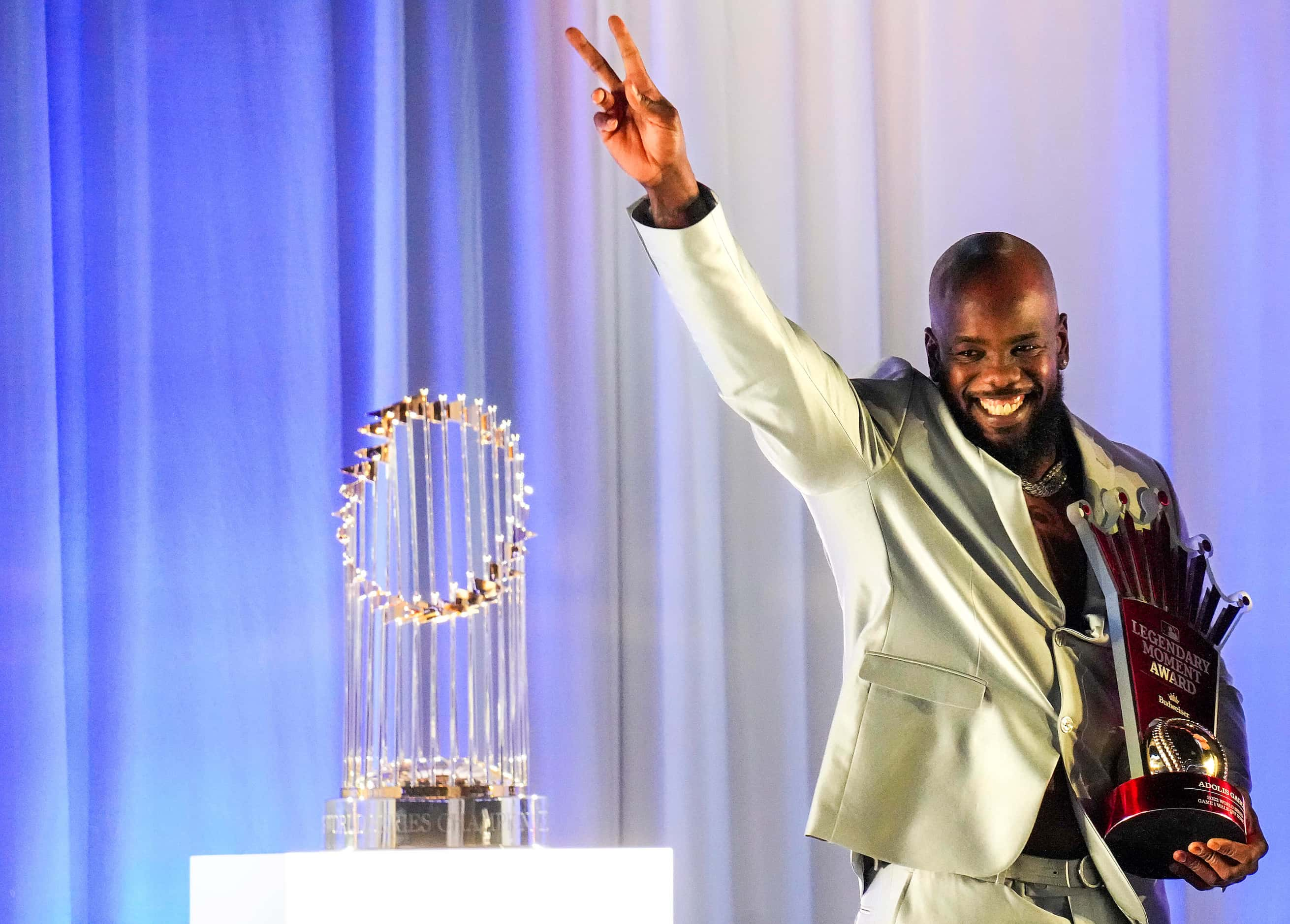 Texas Rangers right fielder Adolis Garcia accepts the 2023 MLB Budweiser Legendary Moment...