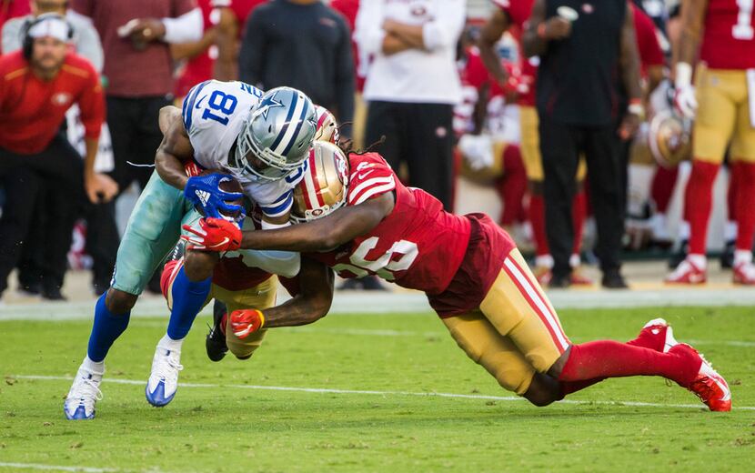 Dallas Cowboys wide receiver Jon'Vea Johnson (81) is tackled by San Francisco 49ers...