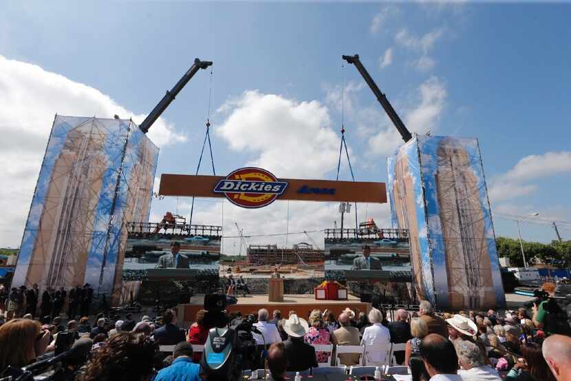 The name of the new Dickies Arena is lifted up at the ground breaking for a $450 million...