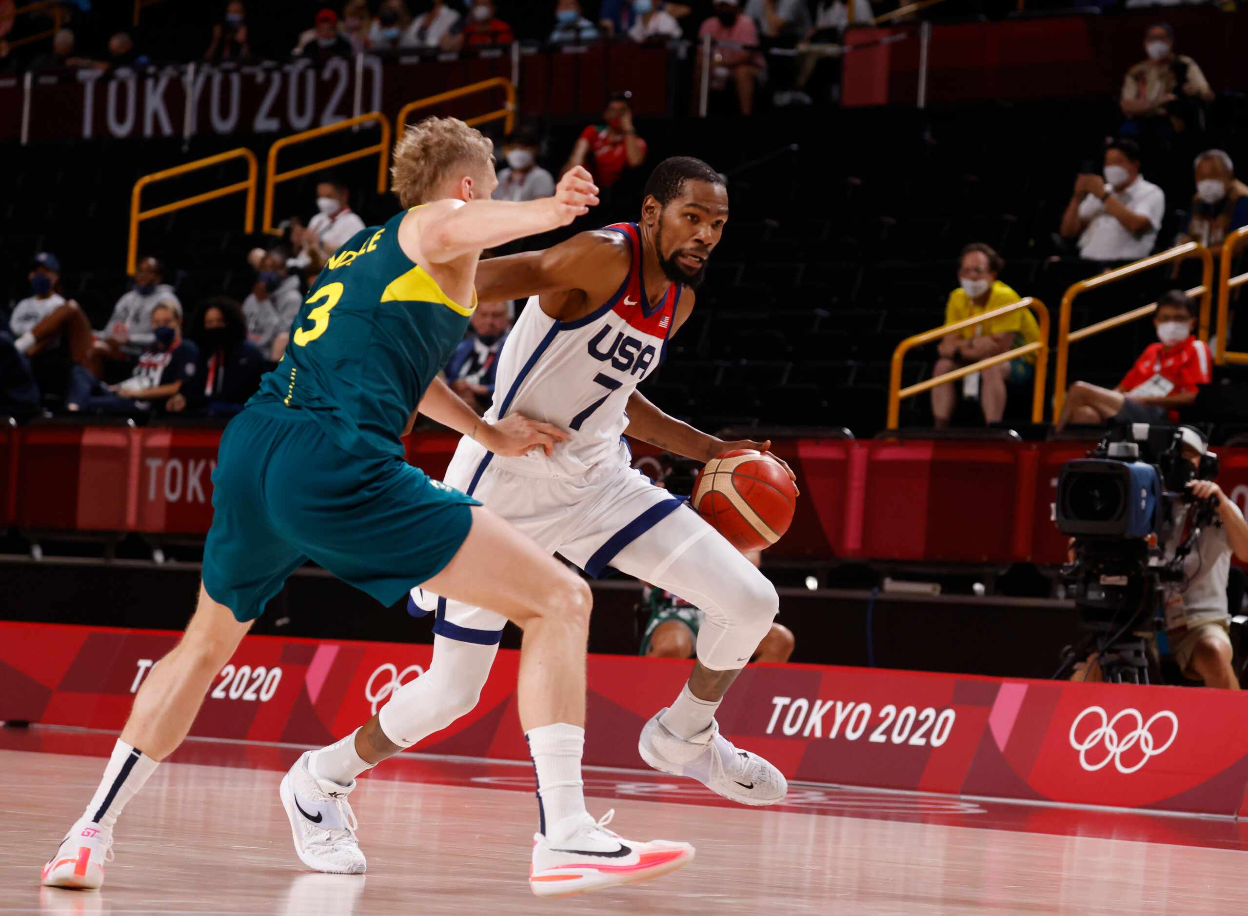 USA’s Kevin Durant (7) drives on Australia’s Jock Landale (13) during the second half of a...