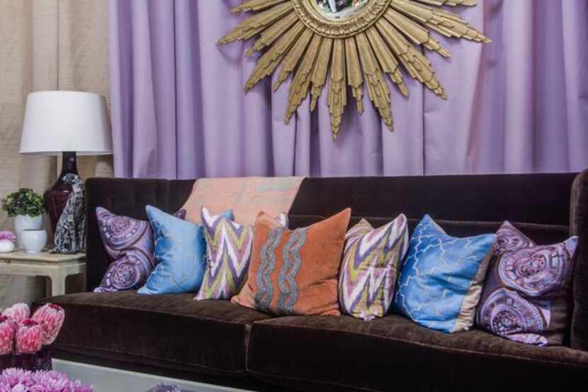 
Mecox
The Knox-Henderson retailer’s vignette features a chocolate sofa layered with pillows...