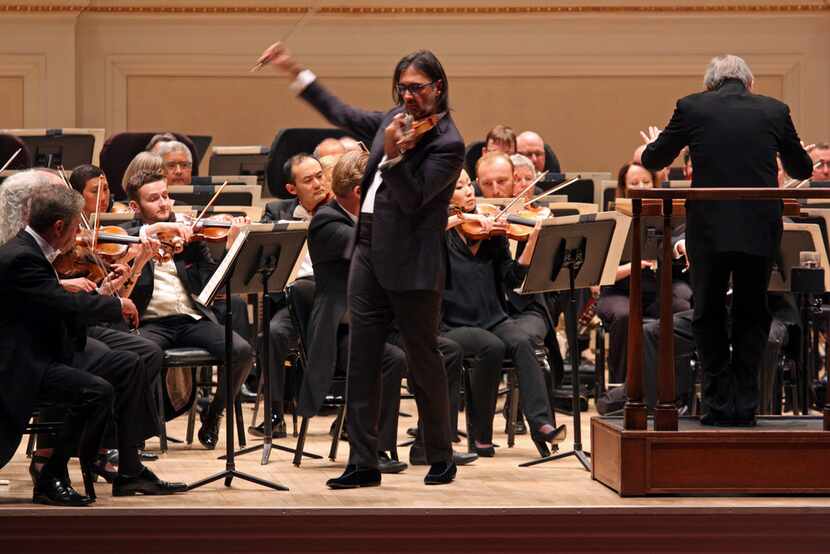 Violinist Leonidas Kavakos performs as soloist at Carnegie Hall, with Michael Tilson Thomas...