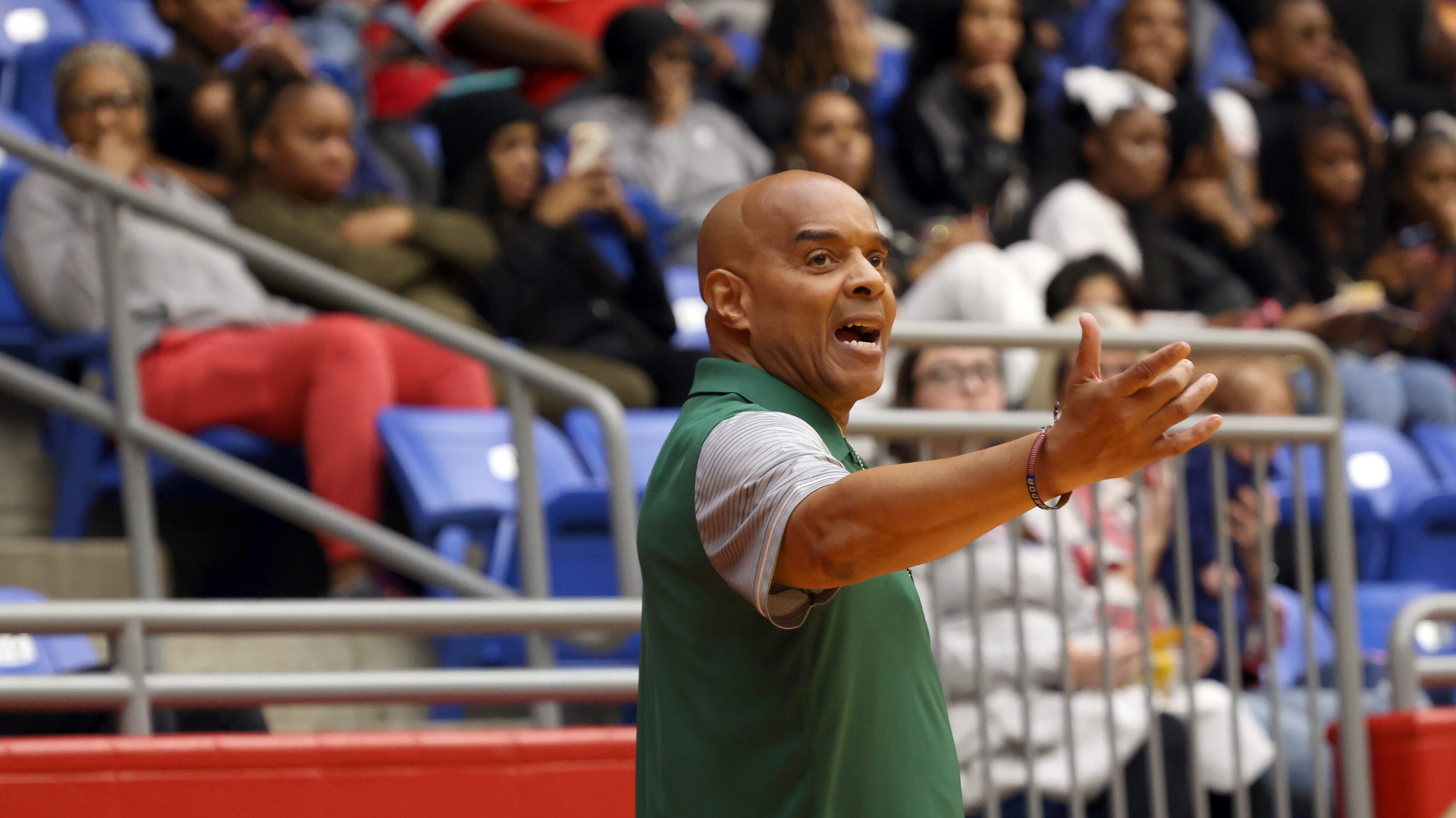 DeSoto head coach Robert Wright reacts following a play during first half action against...